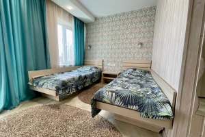 Двухместный номер с 2 отдельными кроватями "Стандарт улучшенный" с балконом